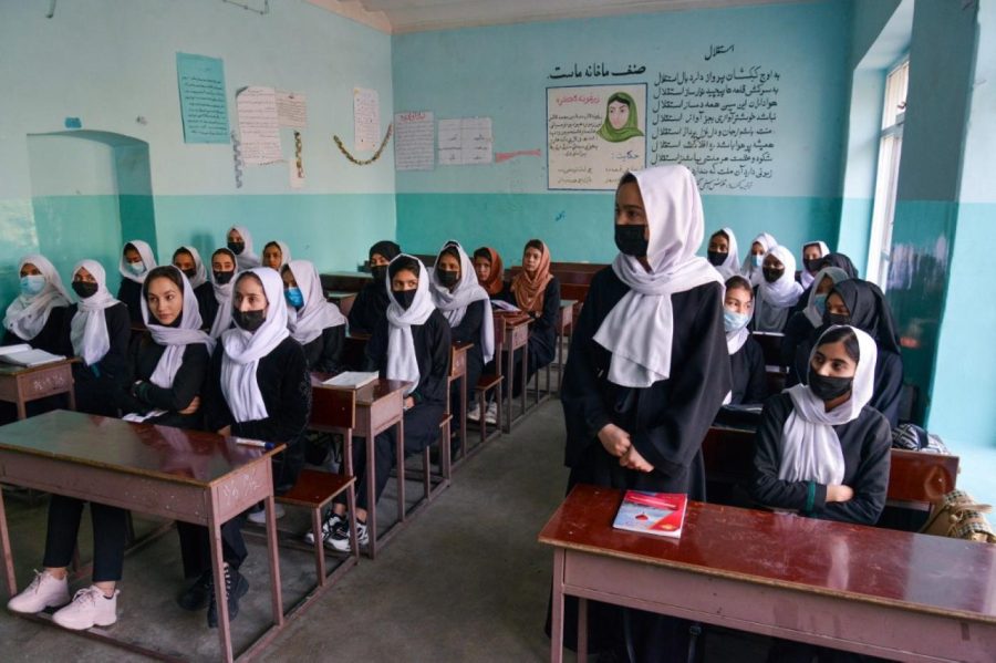 Girls+attend+a+class+after+their+school+reopening+in+Kabul+on+March+23%2C+2022.+The+Taliban+ordered+girls+secondary+schools+in+Afghanistan+to+shut+on+March+23+just+hours+after+they+reopened.+AFP